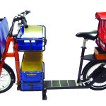 Loadrunner mit Postkisten und Zeitungstaschen